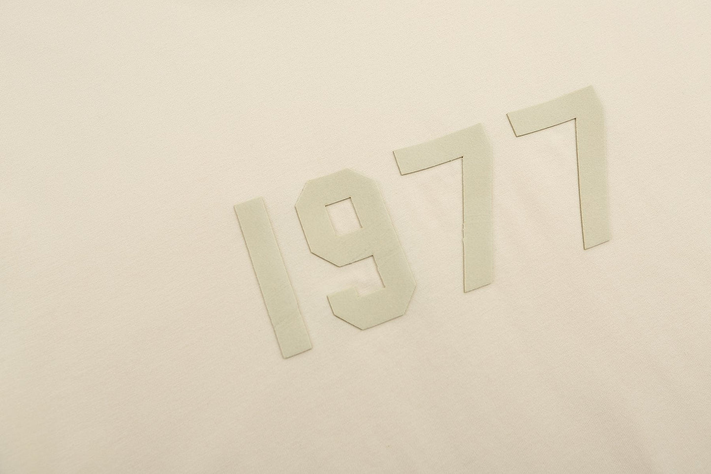 ESSENTIALS 1977 Tonal Wordmark Mock-Neck T-Shirt — detail