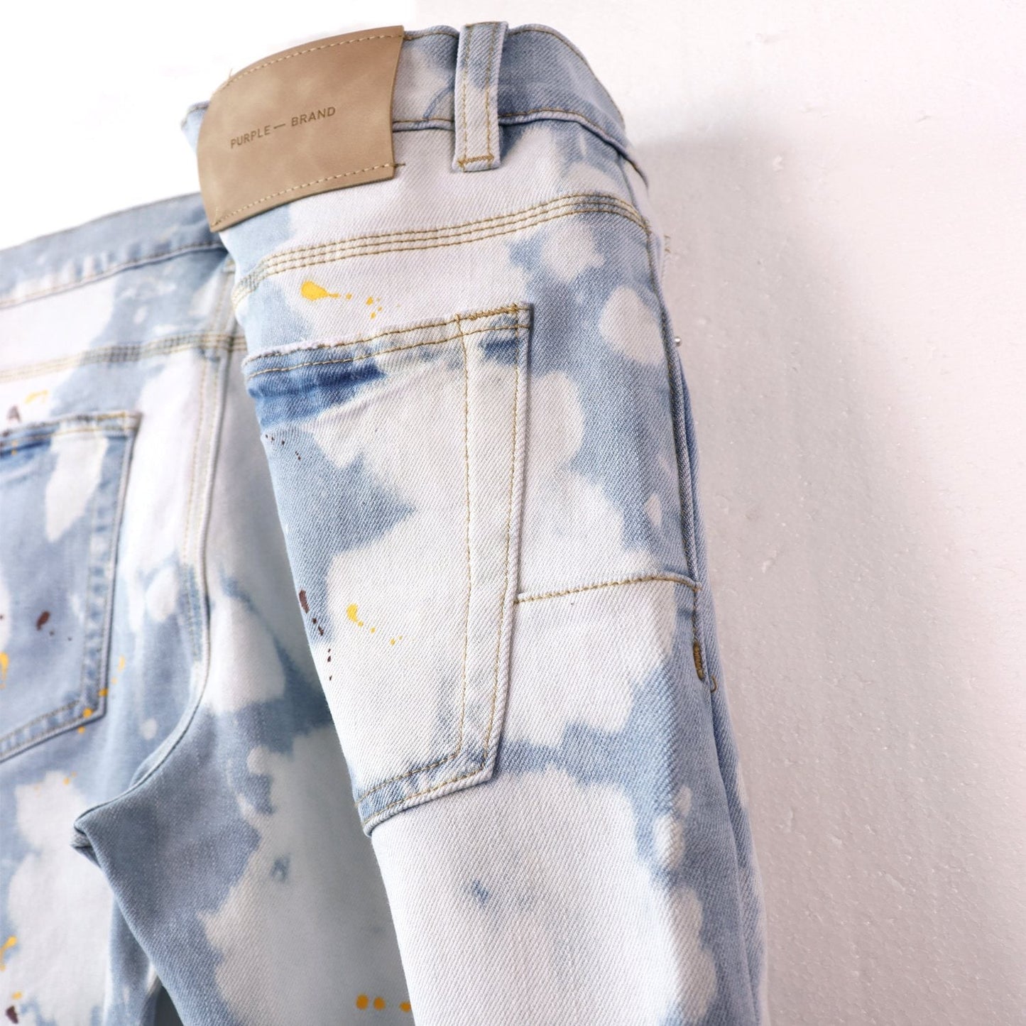 Purple Brand Light Blue Bleached Paint Splatter Skinny Jeans — detail