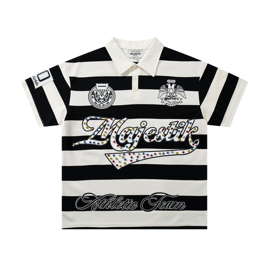 MAJESTIK Striped Crest Graphic Polo Shirt — hero